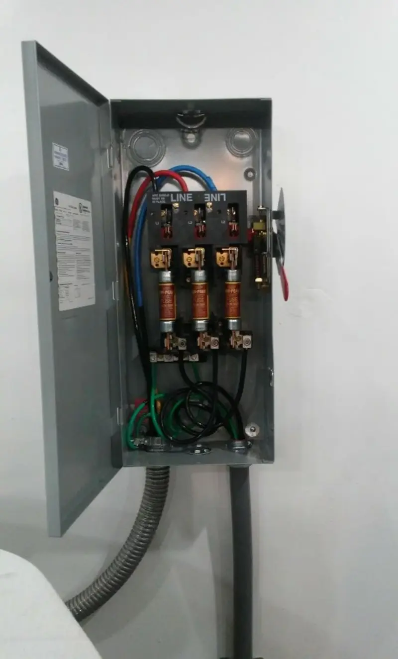 Three-phase disconnect switch installed for Smoke Detector Installation in Huron